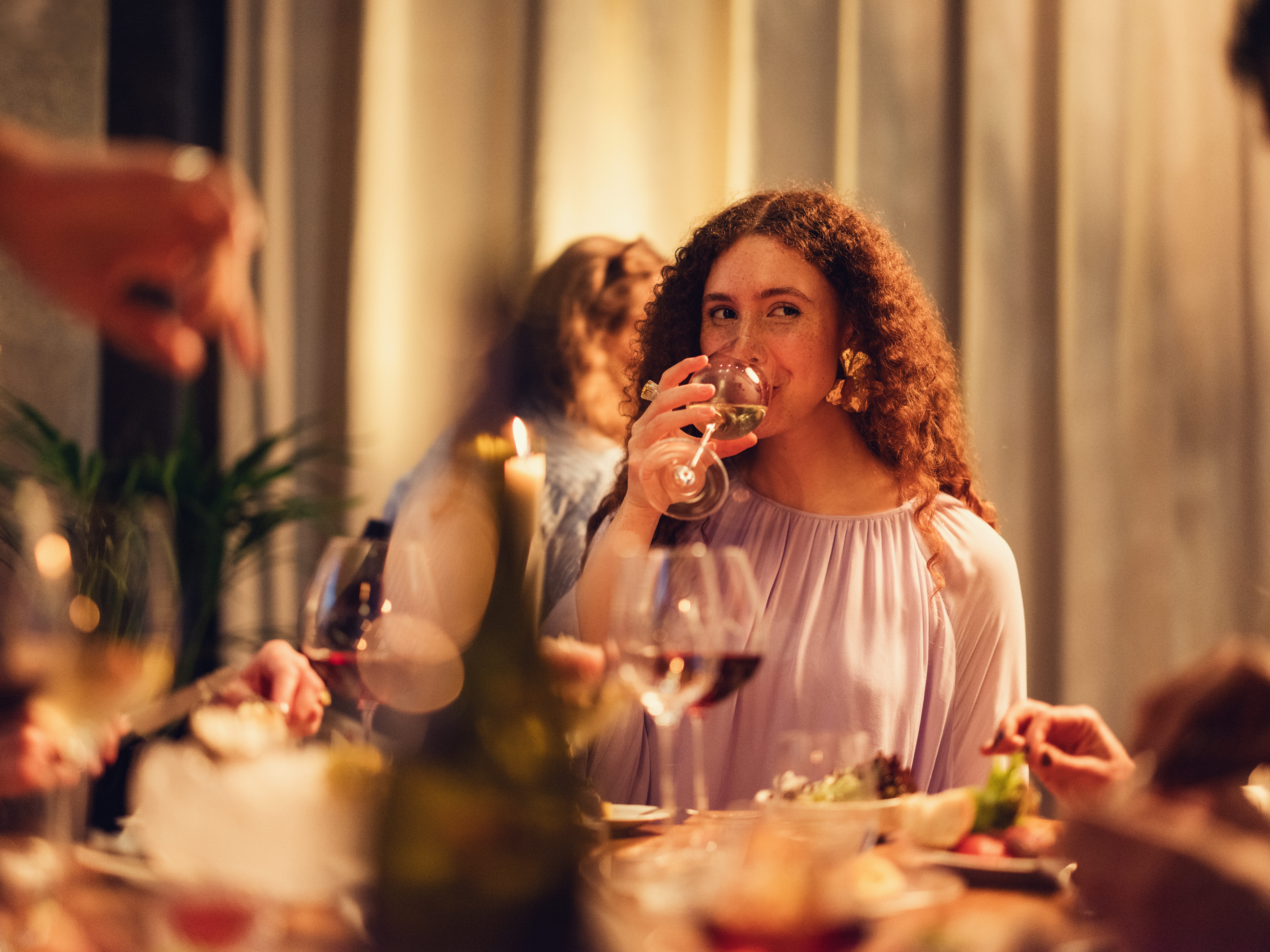 Woman drinking wine Blanche & Hierta